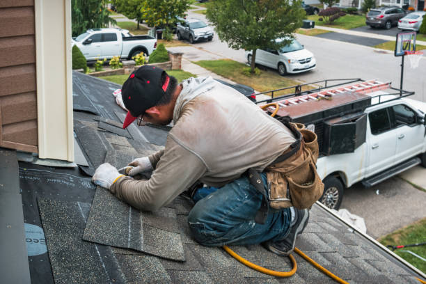 Professional Gutter Installation technician working in Prides Crossing, MA